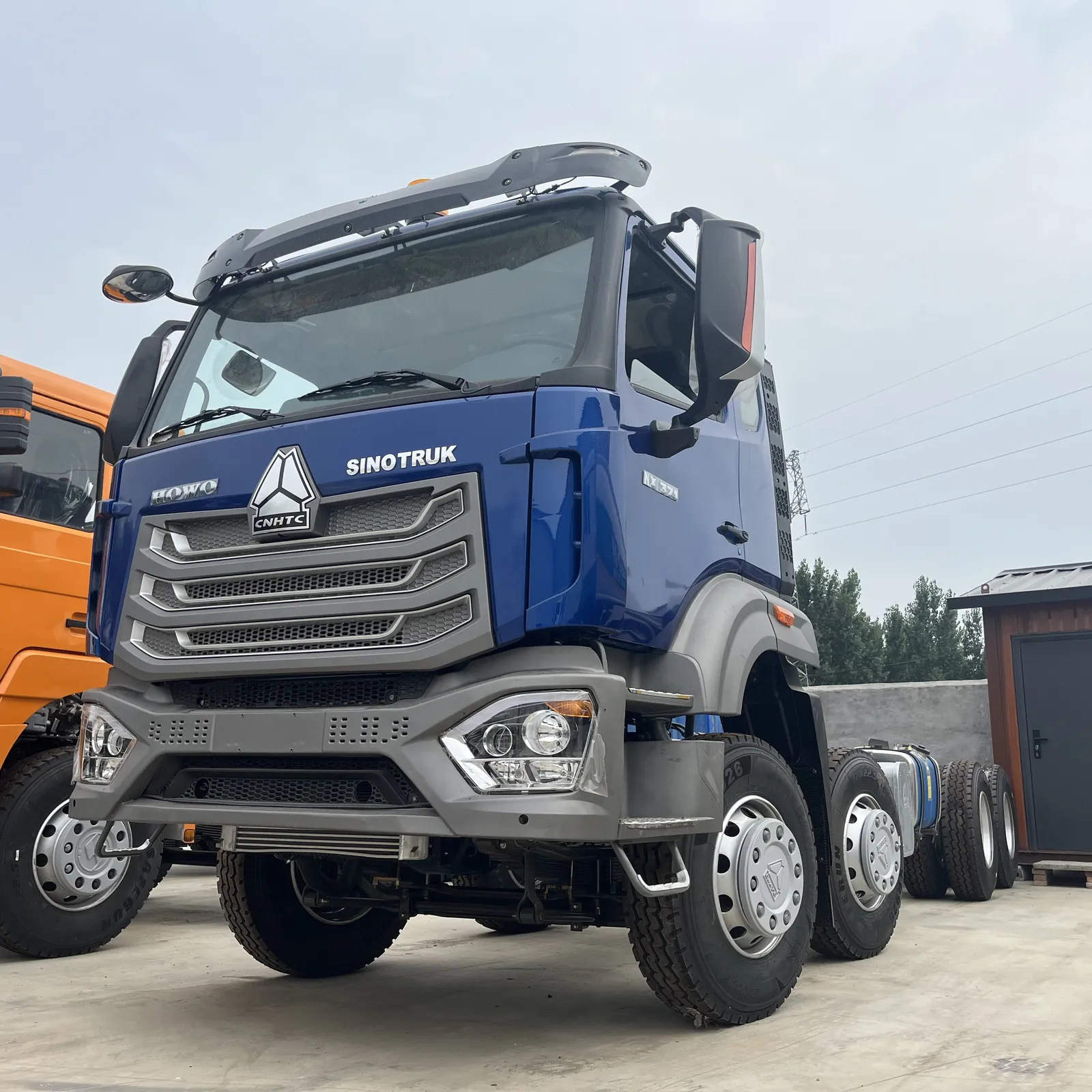 Used HOWO NX 8x4 chassis, front-left